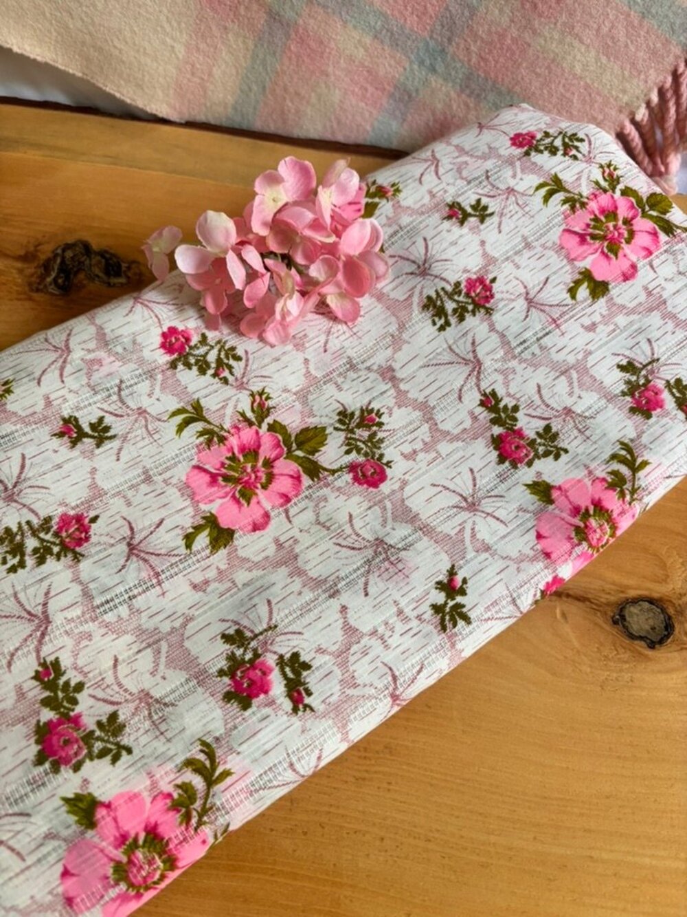 Vintage 1970s floral fabric with pink flowers extured with vertical lines